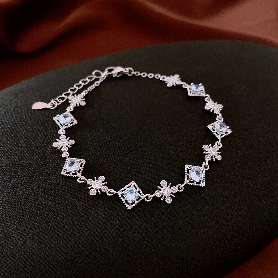 Trinity Bloom – Delicate Charm Bracelet