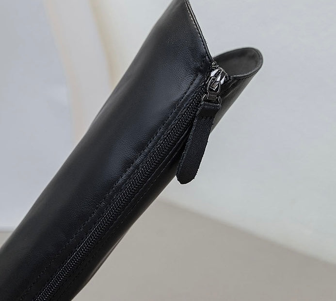 Kniehohe Plateau-Stiefel aus
Leder